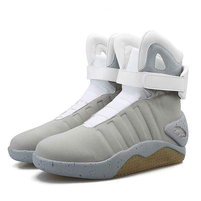 Gray high-top sneakers with white accents on a white background