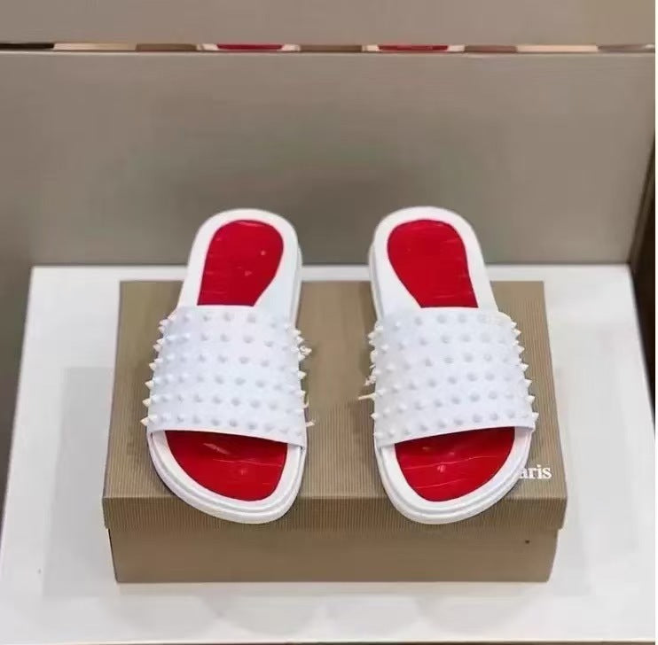 LOUBOUTIN SLIDES (1) 25