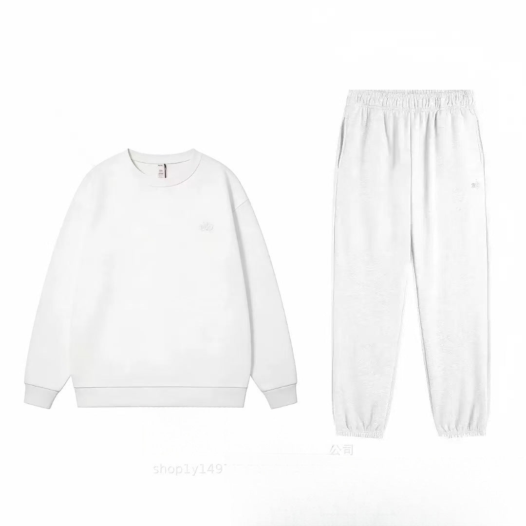 White sweatshirt and pants set on a white background