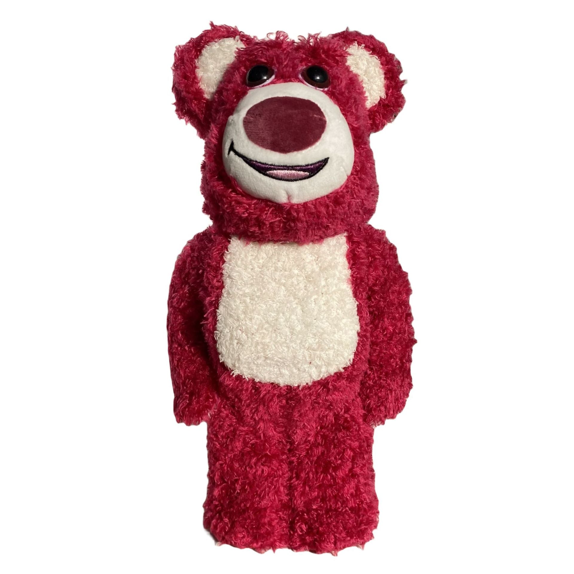 A plush teddy bear costume in a textured deep red fabric with a cream-colored snout, inner ears, and chest patch, shown against a plain white background.