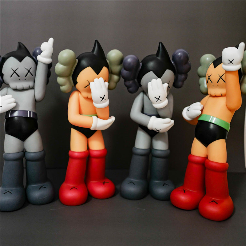 Four stylized cartoon figurines posed side by side against a dark gray studio background. The characters have black-and-white faces with X eyes, white gloves, and oversized boots in gray, red, and dark blue tones, with some wearing black briefs and one with a green waistband.