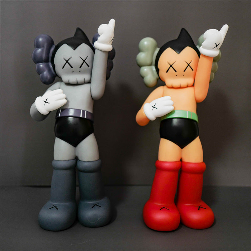 Two stylized cartoon figurines standing side by side against a dark gray background. The left figure is pale gray with dark purple hair, black shorts, and gray boots.
