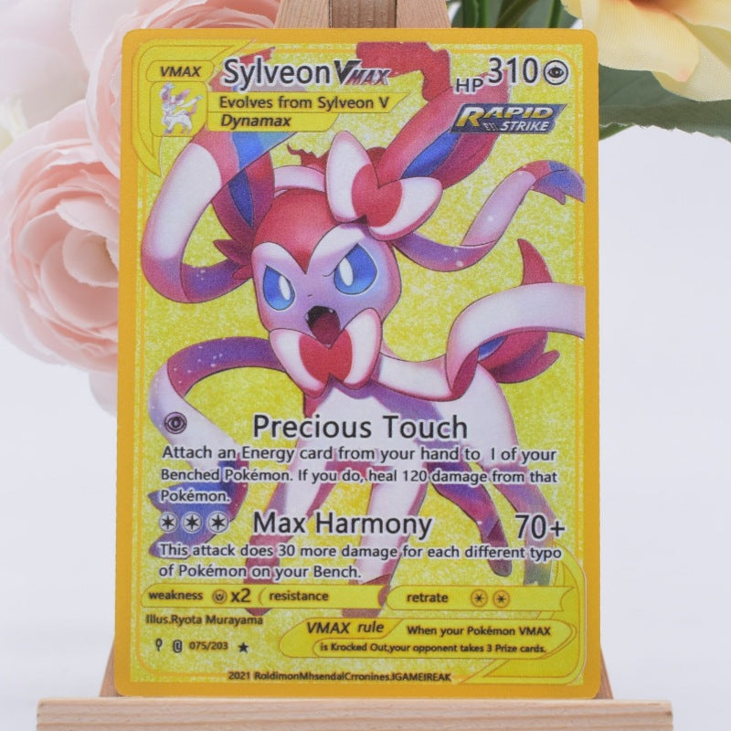 A holographic Pokémon trading card featuring Sylveon, displayed on a small wooden stand against a soft pink floral background.