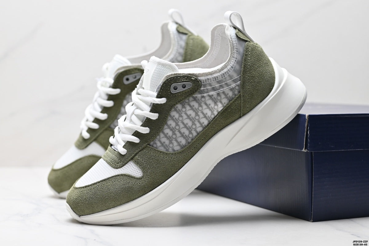 Green and white sneakers on a light gray background