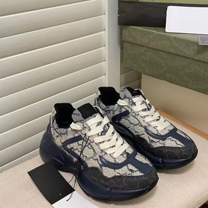 Pair of patterned sneakers on a chair with a blurred background