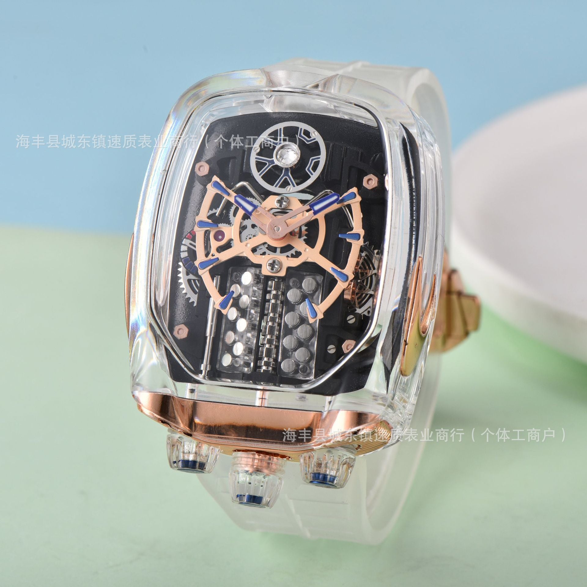 Luxury watch with intricate design and rose gold accents on a light blue and green gradient background