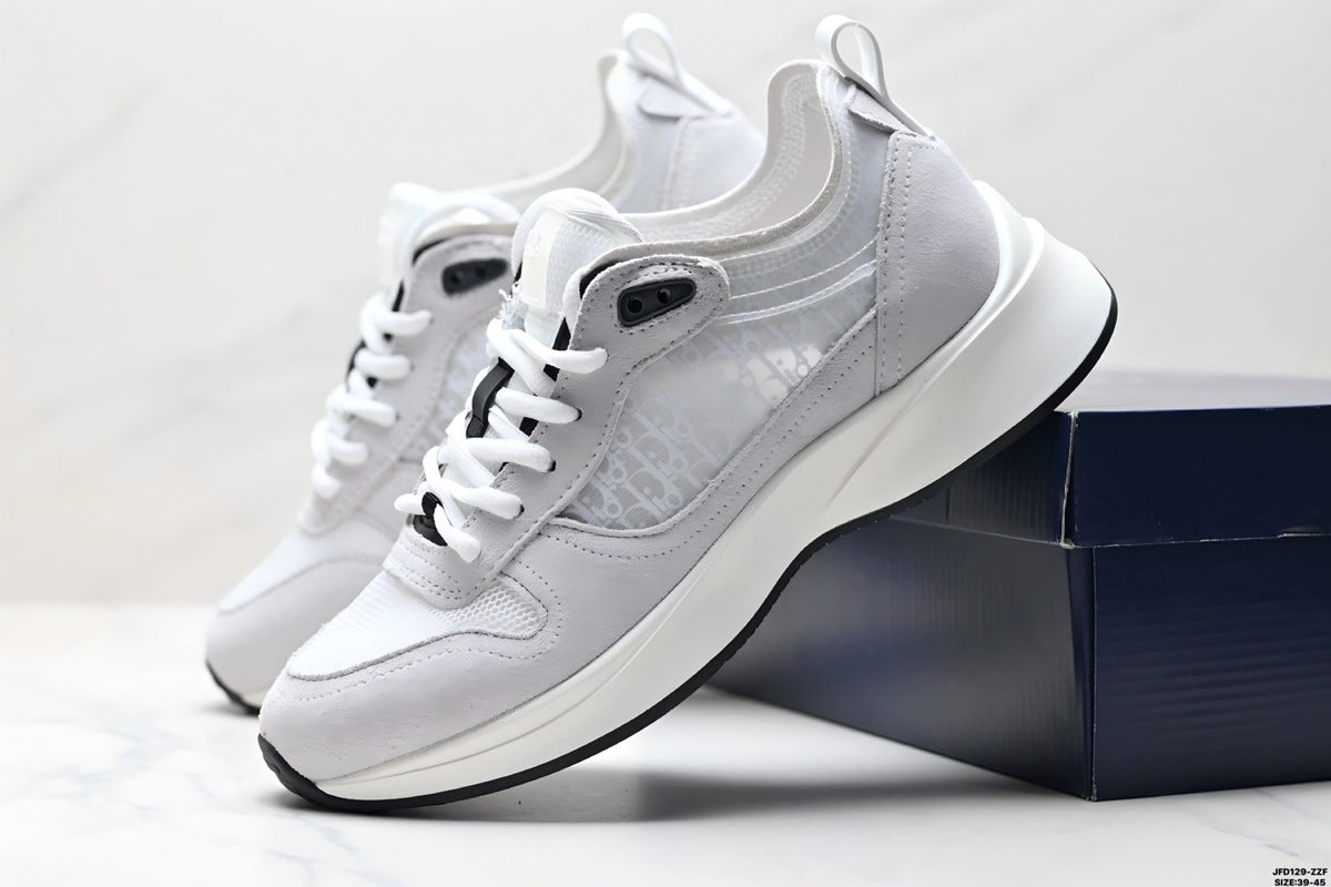 Gray sneakers with white soles on a light gray background