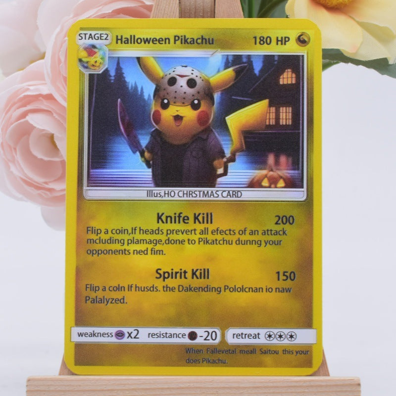 A holographic Pokémon trading card featuring Halloween Pikachu, displayed on a small wooden stand with pink roses in the background.