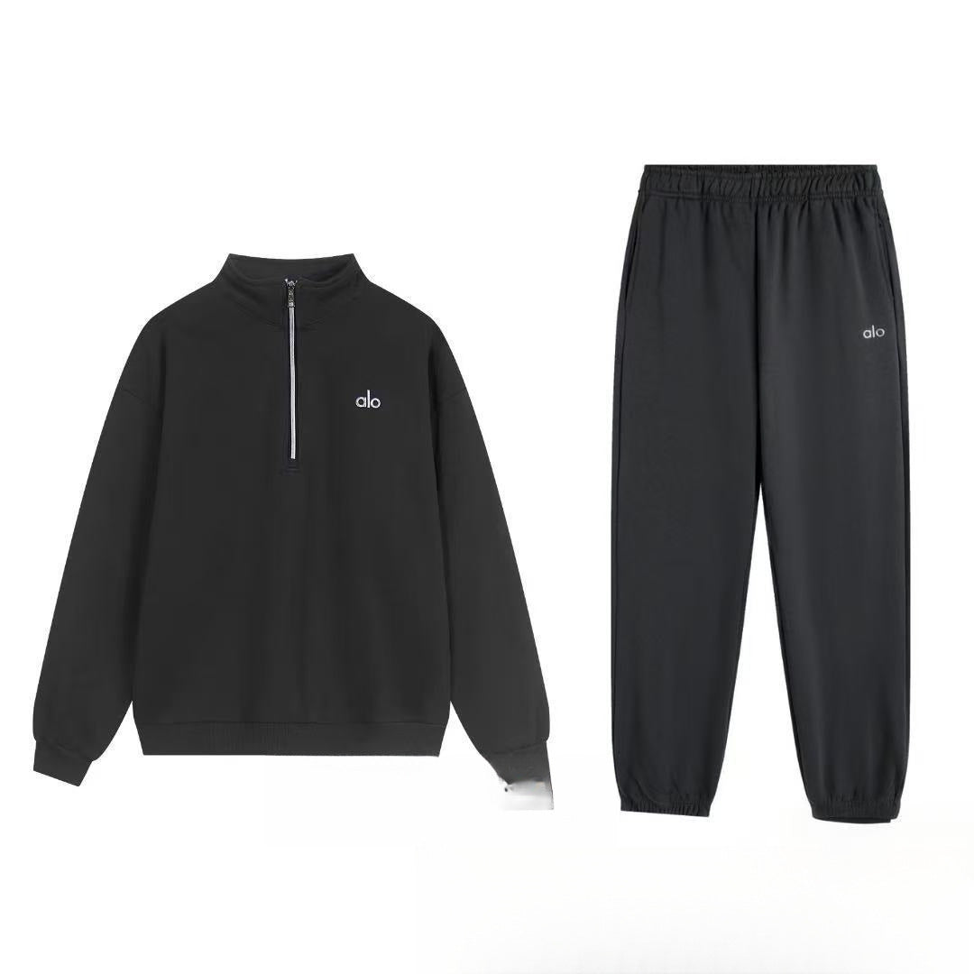 Gray hoodie and pants set on a white background