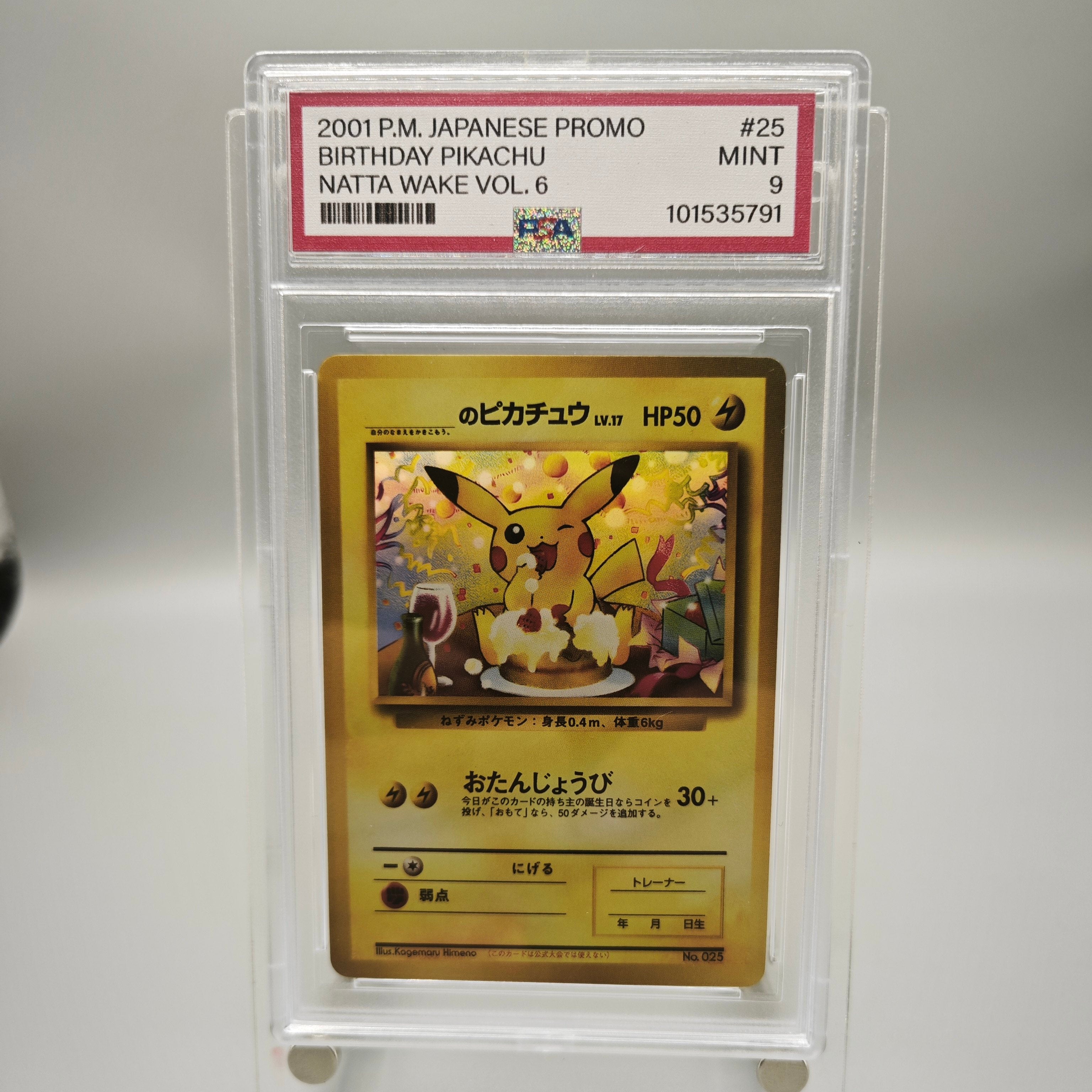 A graded Pokémon trading card in a clear plastic holder. The card is a 2001 P.