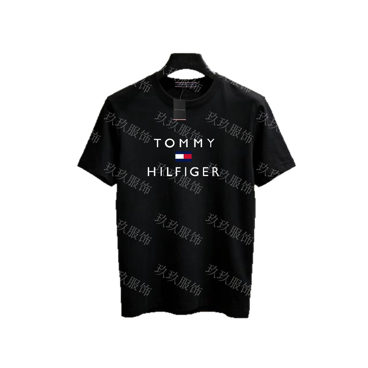 Black Tommy Hilfiger t-shirt on a hanger with white background