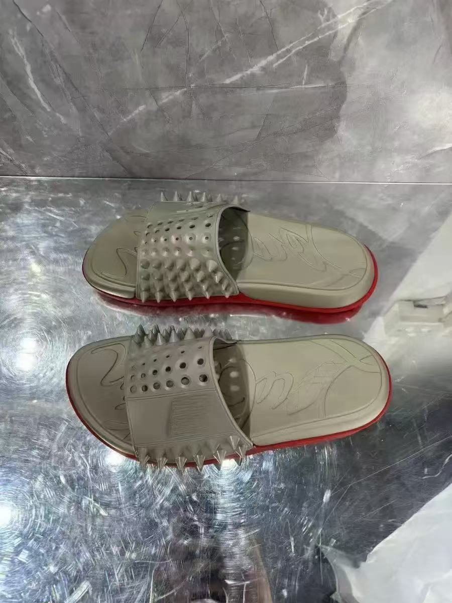LOUBOUTIN SLIDES (1) 22