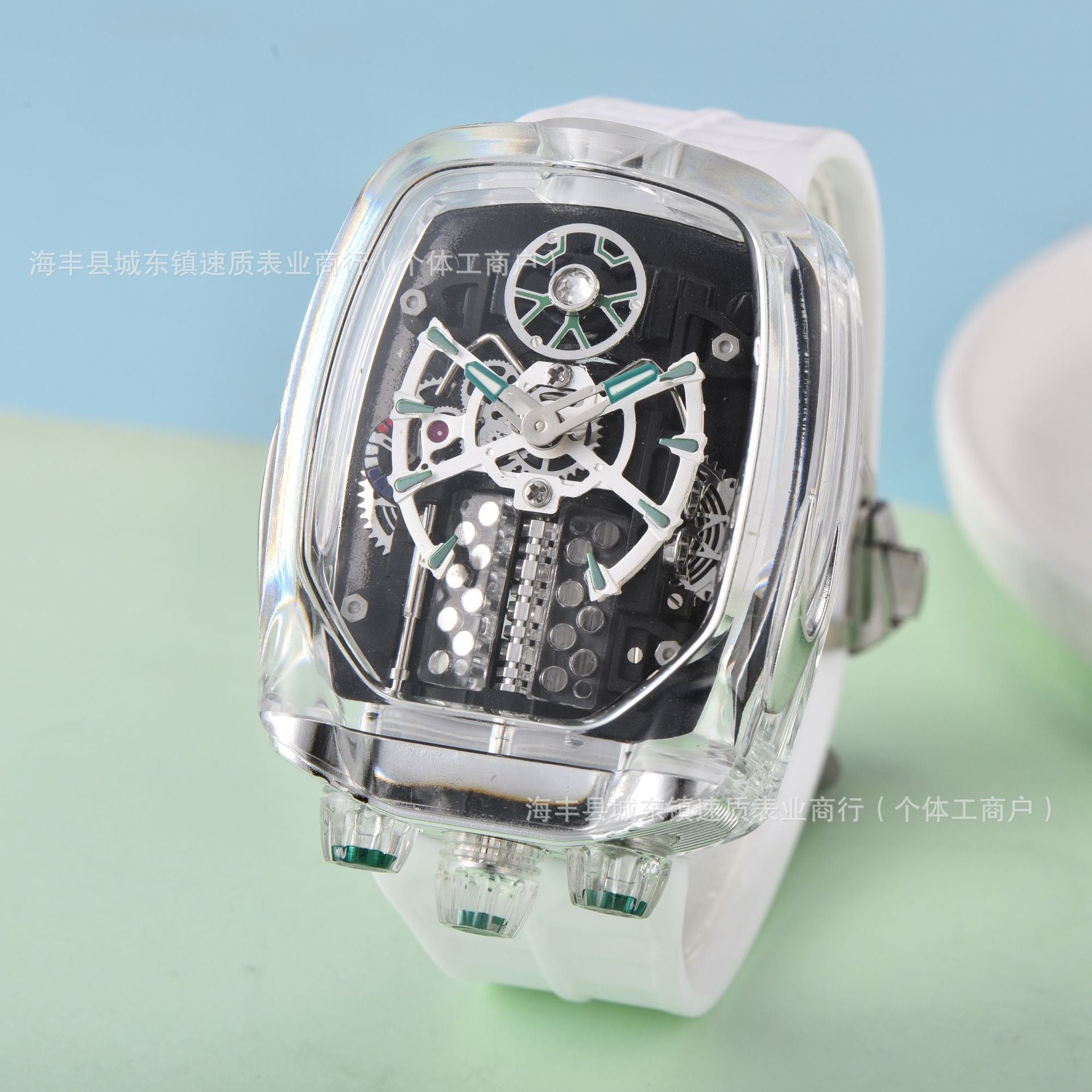 Transparent wristwatch with mechanical components on a light blue and green gradient background