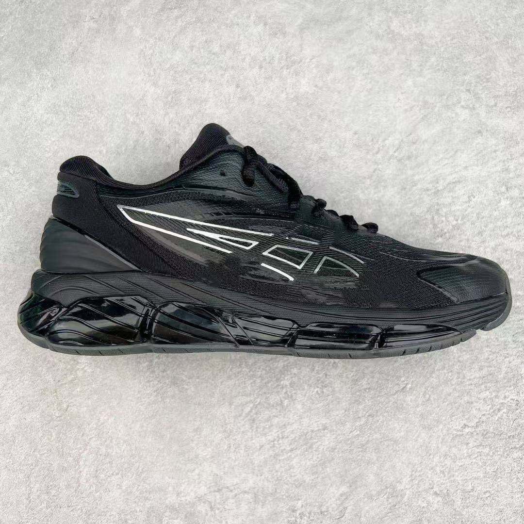 Black athletic shoe on a light gray background