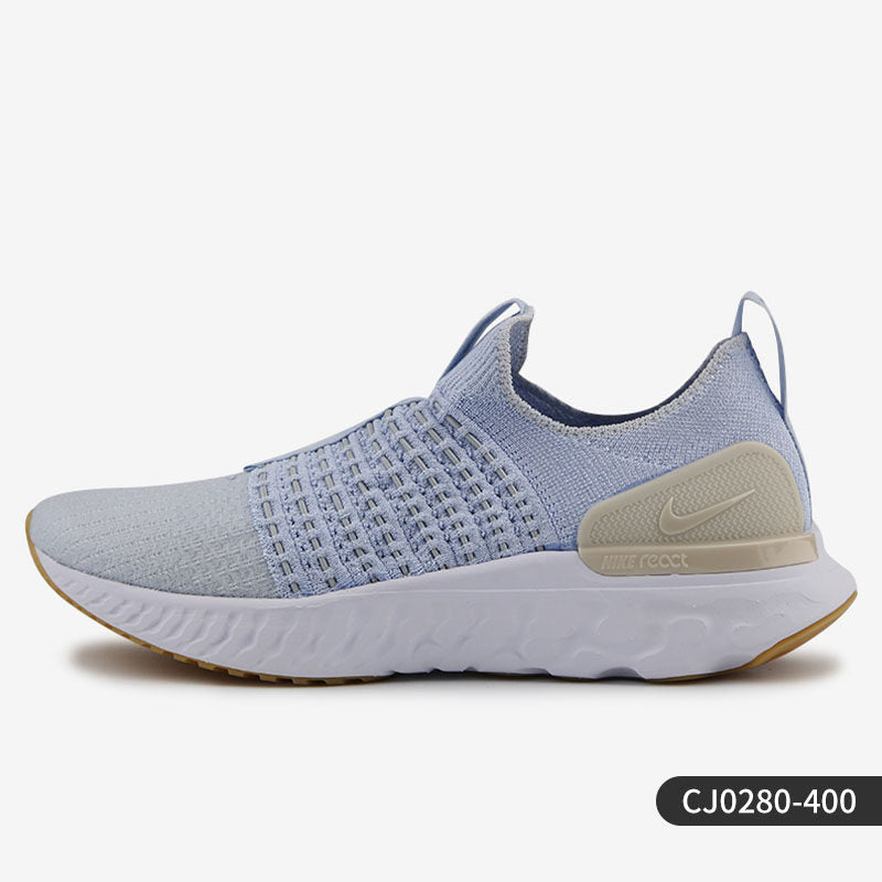 Light blue athletic shoe with a Nike logo on a white background