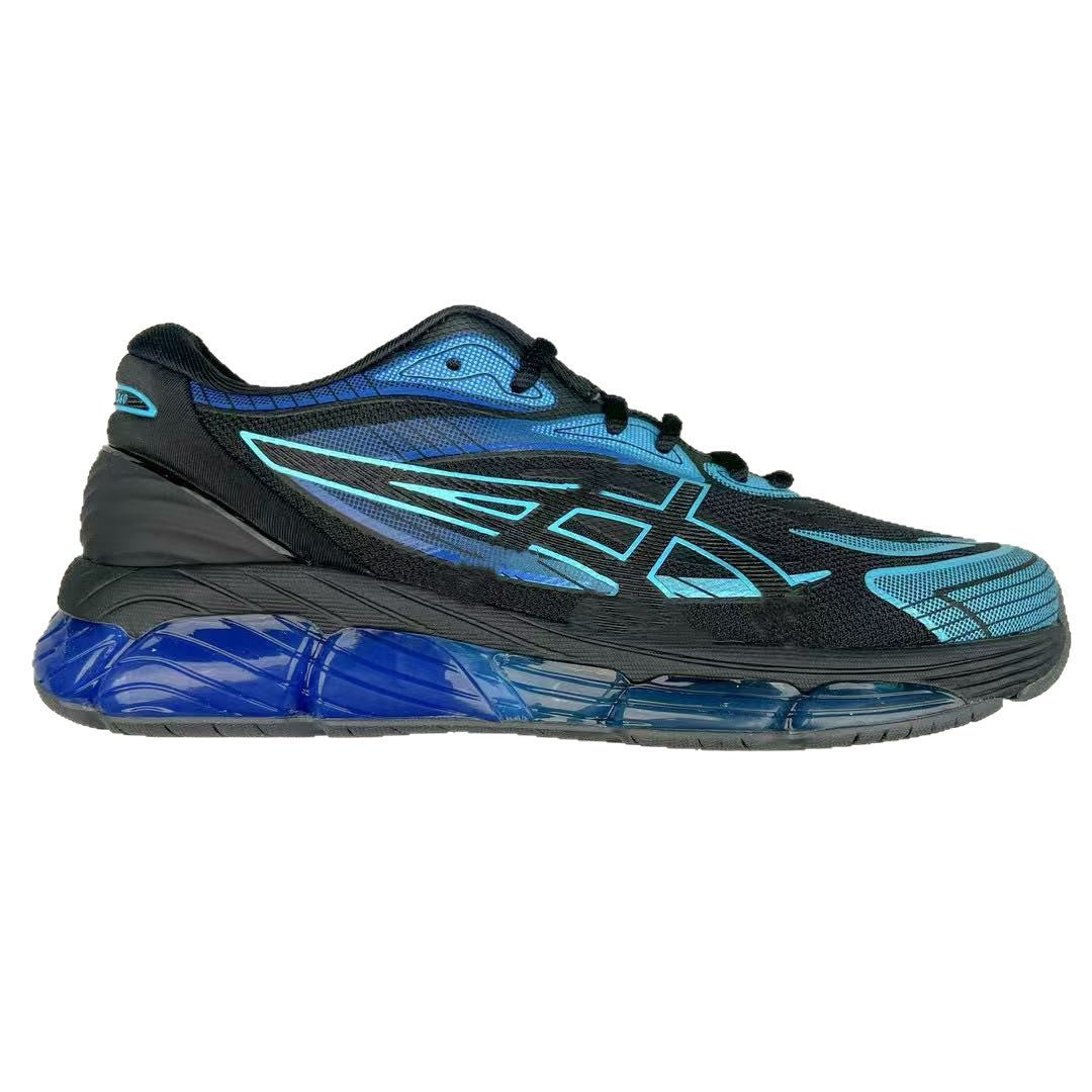 Black and blue running shoe on a white background