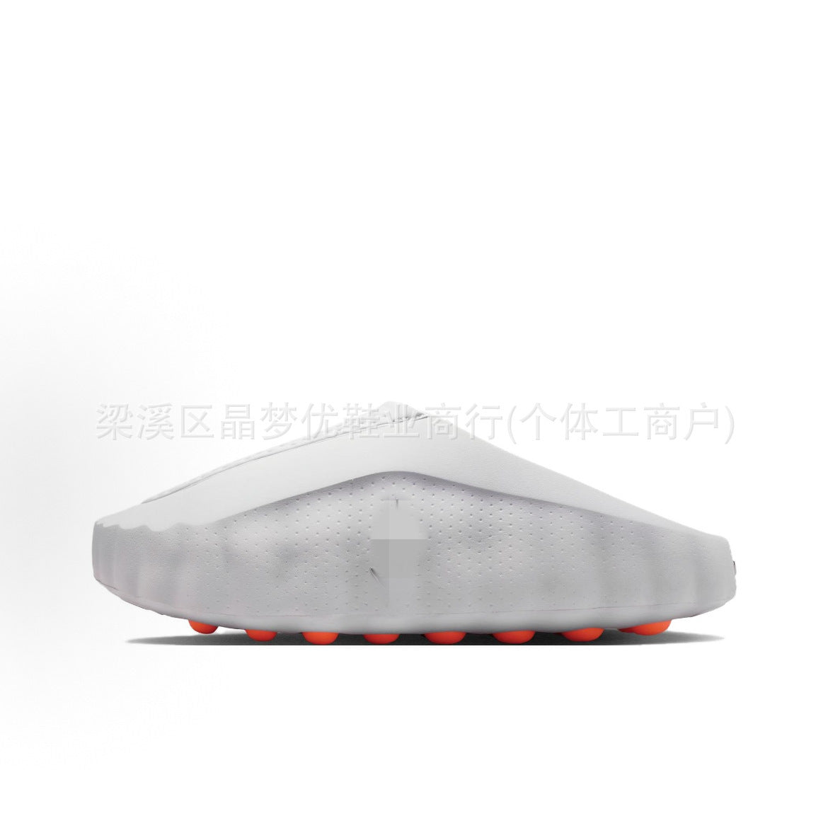 White shoe cover with red accents on a white background