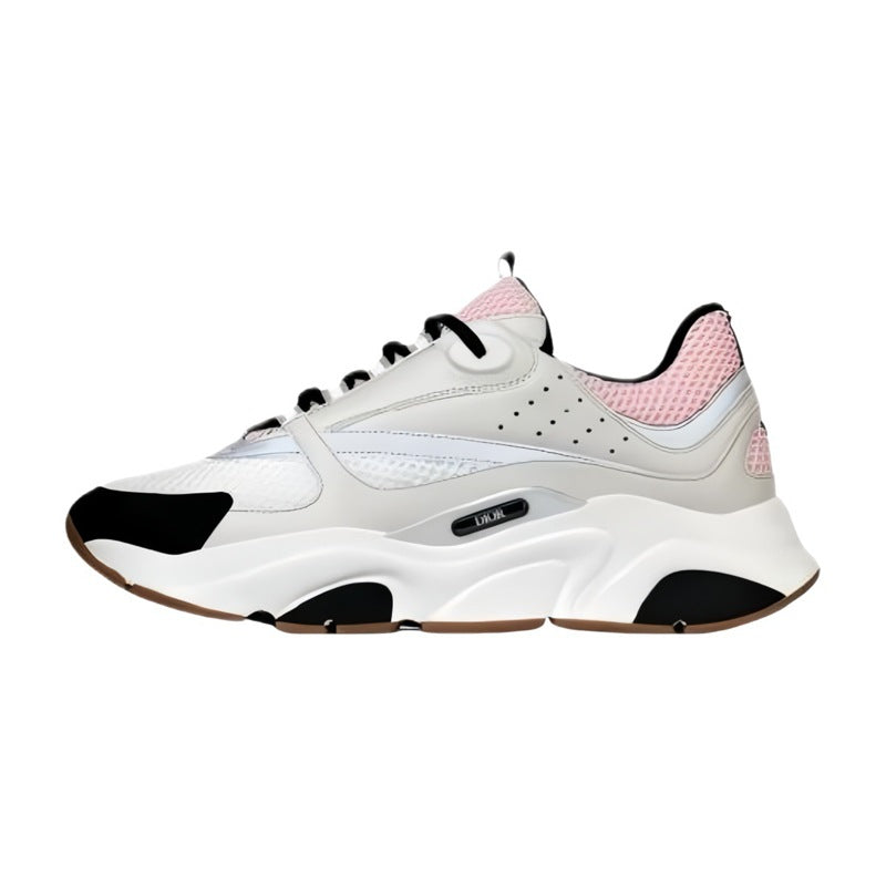 White sneaker with pink and black accents on a white background