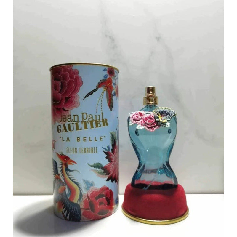 Jean Paul Gaultier La Belle perfume bottle and packaging on a white background