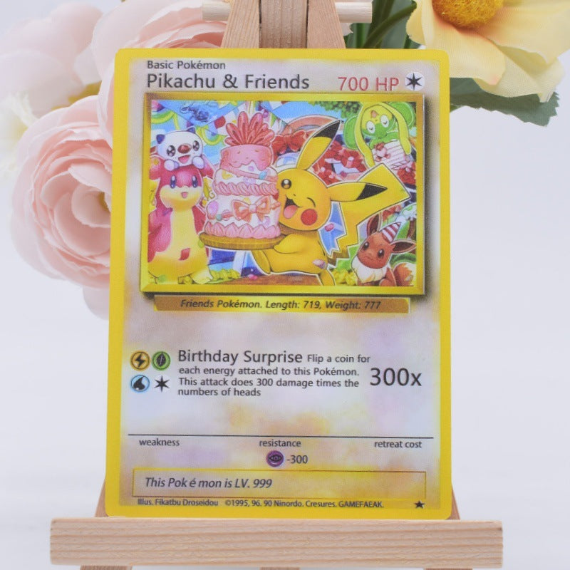 A Pokémon trading card featuring Pikachu & Friends, displayed on a small wooden stand with pink and yellow flowers in the background.