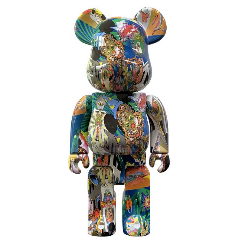 A collectible bear-shaped figure with a glossy, highly detailed multicolor tropical and street-art style print, set against a plain white background.