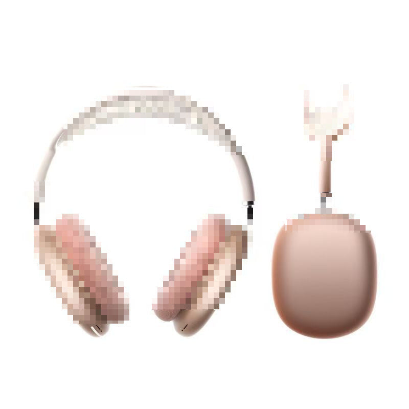 A pair of over-ear wireless headphones in a pale blush pink and champagne gold color, shown alongside a matching round wireless charging case on a plain white background.