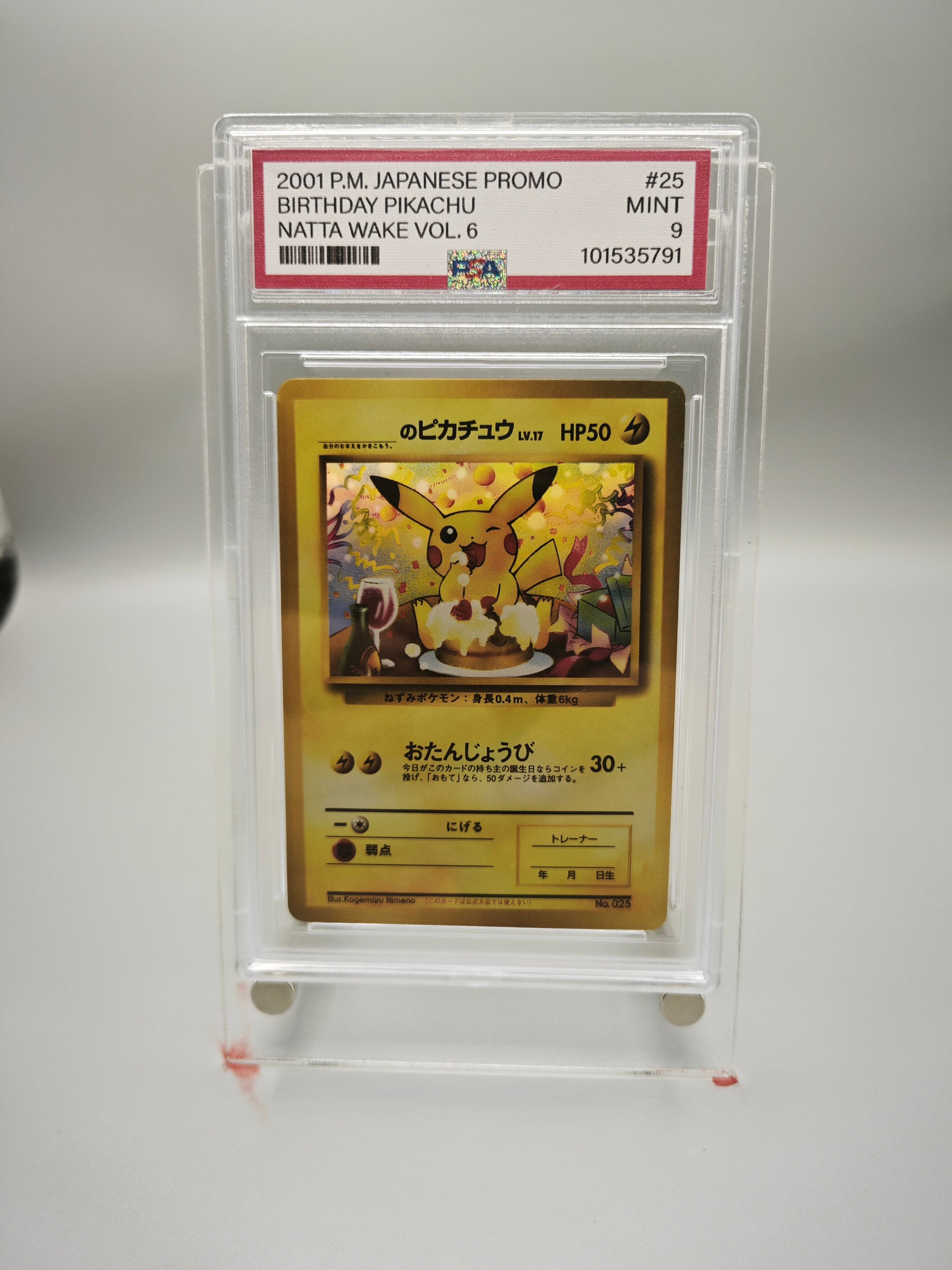 A graded Pokémon TCG card in a clear plastic protective case on a white background. The card is a 2001 P.