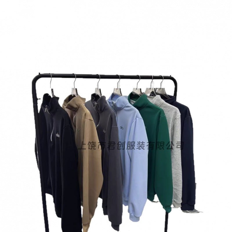 Collection of hoodies on a rack with a white background