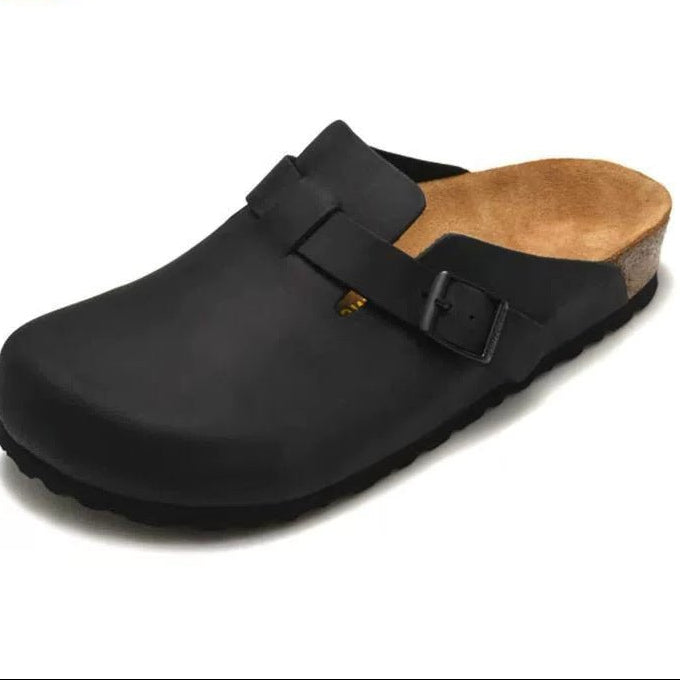 Black clog shoe with wooden sole on a white background
