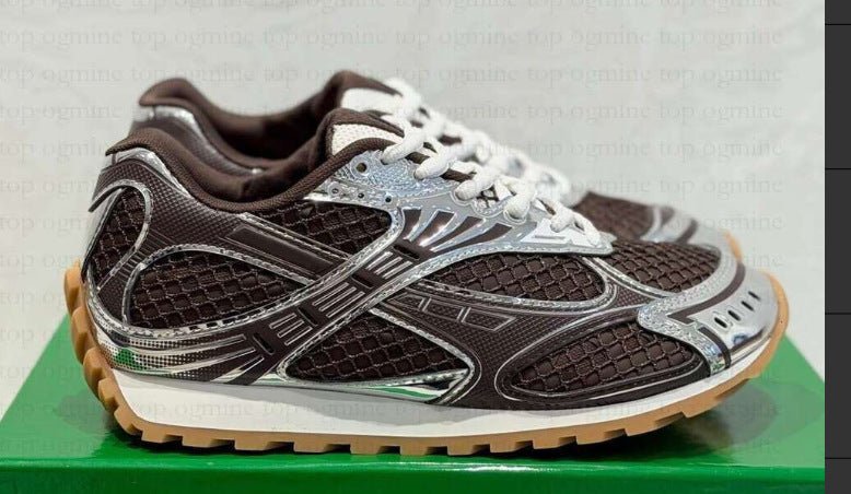 Brown and silver sneaker on a green surface with a light gray background