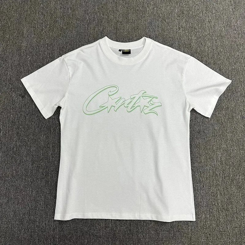 White t-shirt with green text on a plain background
