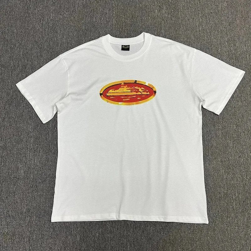 White t-shirt with a colorful graphic on a gray background