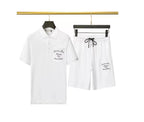 White t-shirt and pants with text on a hanger against a white background