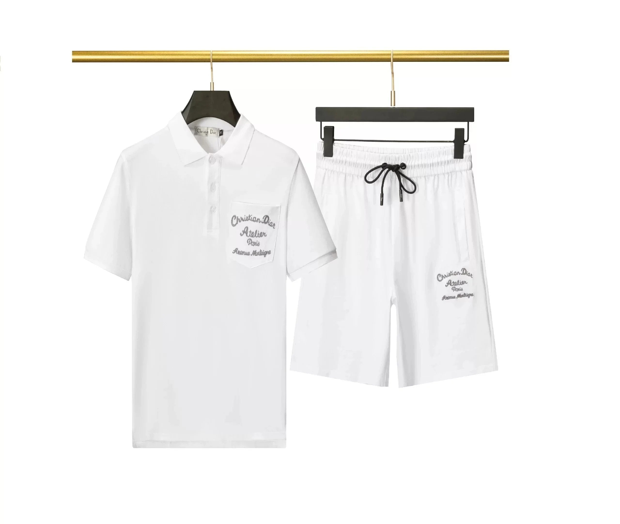 White t-shirt and pants with text on a hanger against a white background
