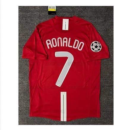 Red sports jersey with 'RONALDO 7' printed on it, displayed against a dark background.