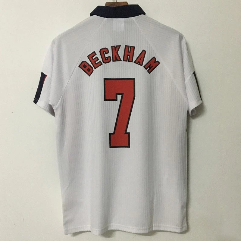 White sports jersey with 'Beckham' and number '7' on a plain background
