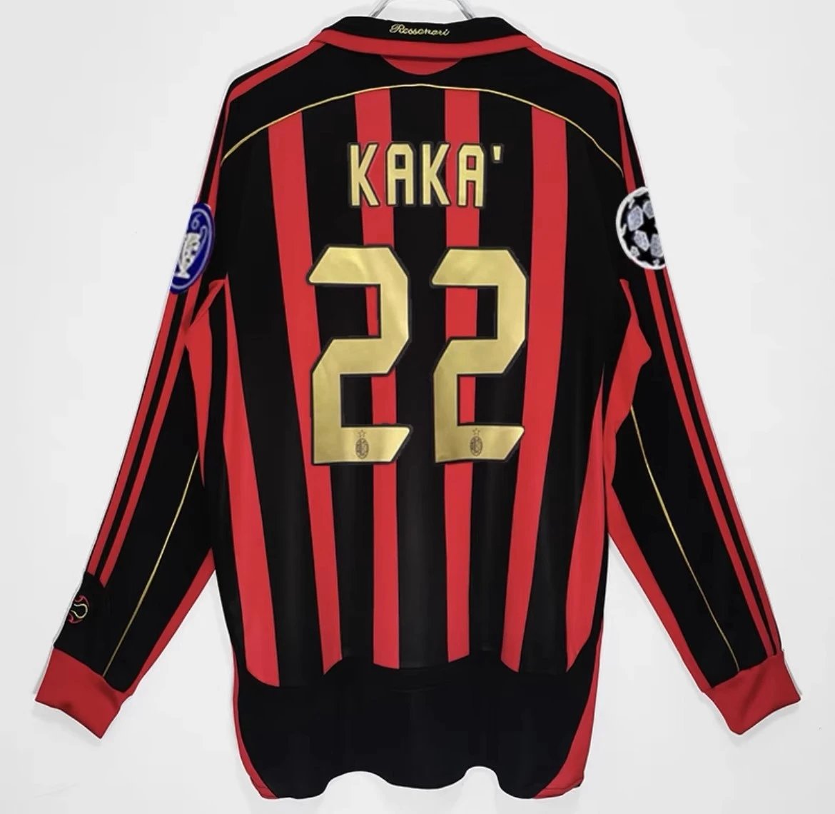 Black and red striped sports jersey with 'Kaka' and number '22' on a white background
