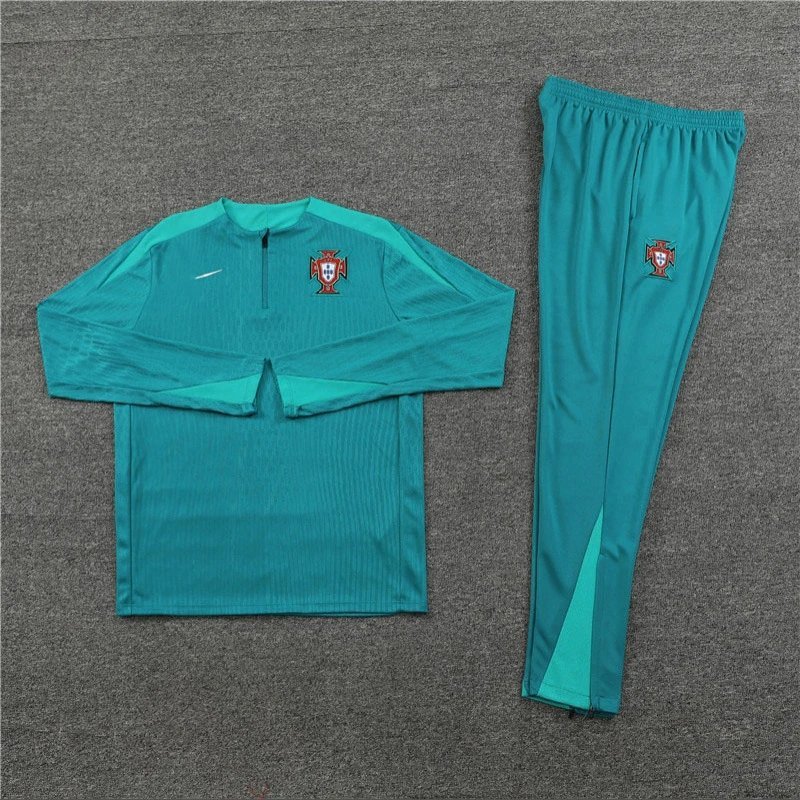 Teal tracksuit with a logo on a gray background