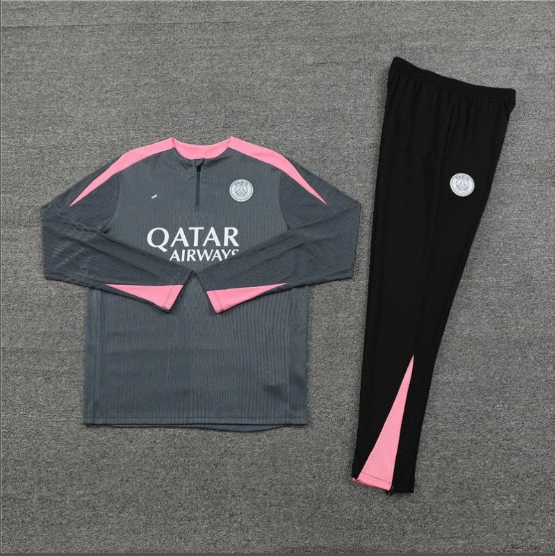 Gray and black sports outfit with pink accents on a gray background
