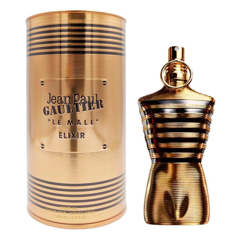 Gold perfume bottle and packaging of Jean Paul Gaultier Le Male Elixir on a white background
