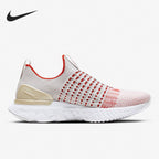 White and red running shoe with Nike logo on a white background