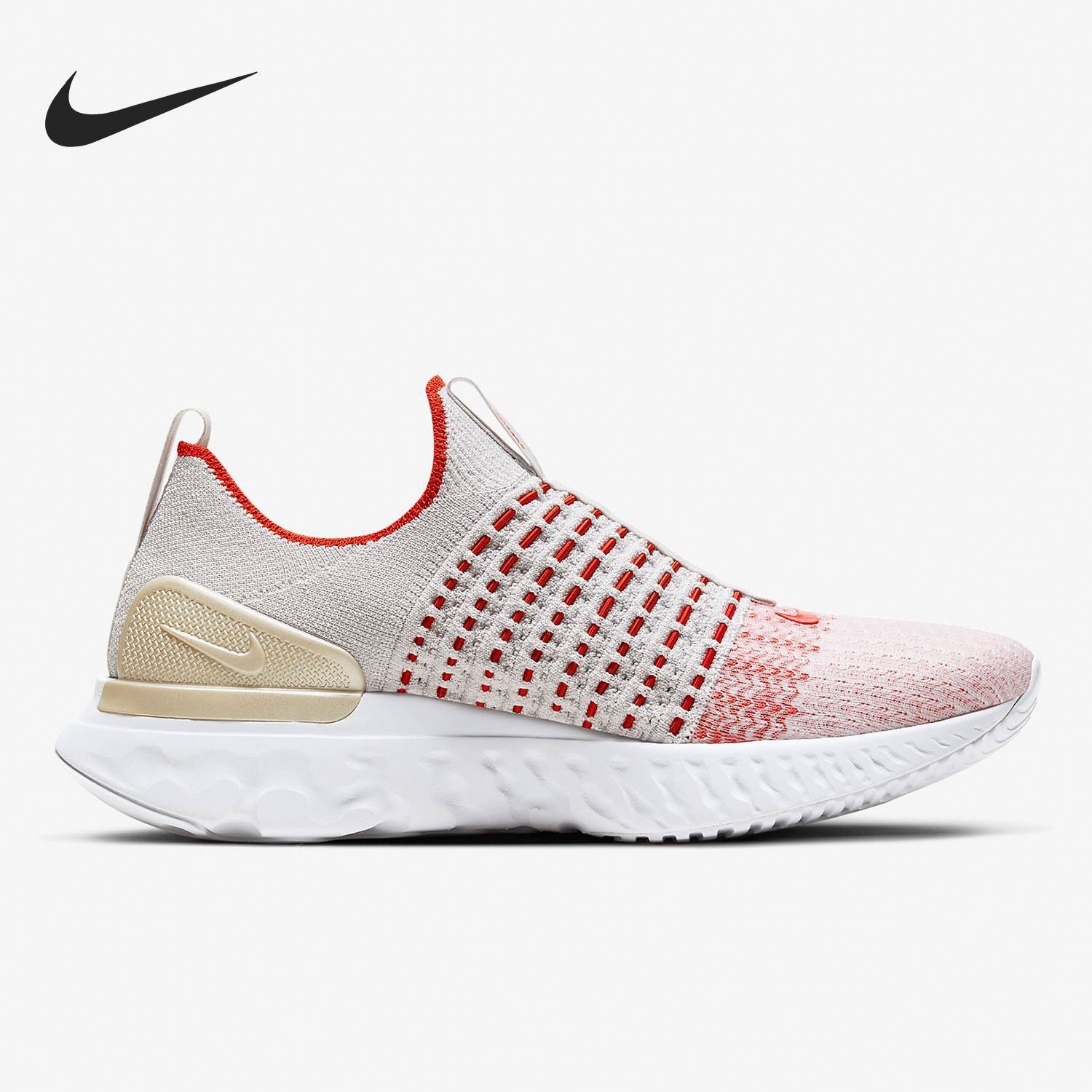 White and red running shoe with Nike logo on a white background