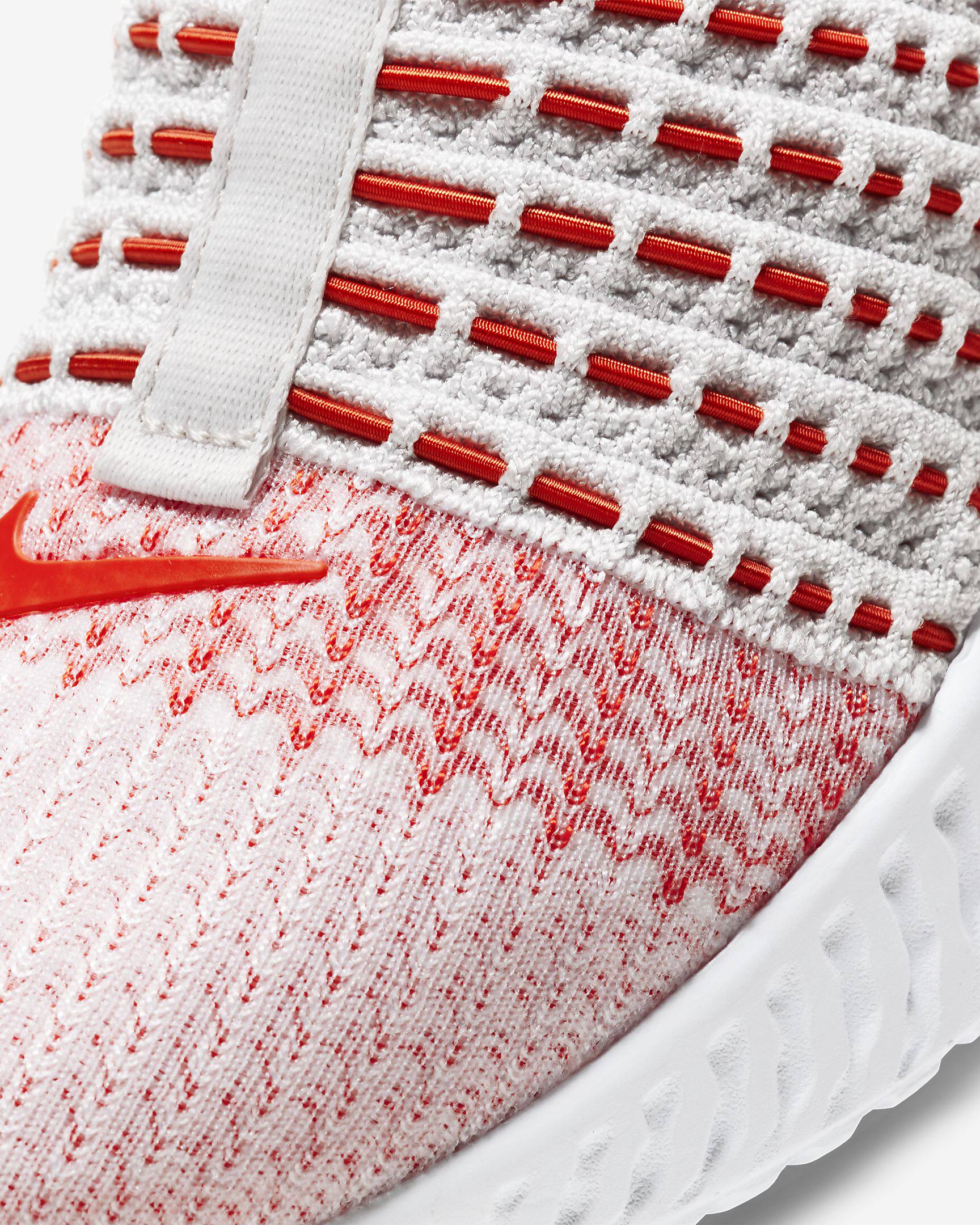 Close-up of a sneaker with red and white pattern