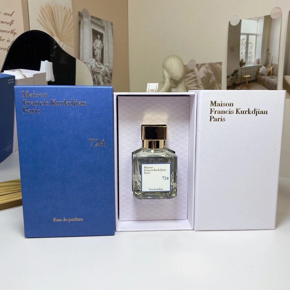 Maison Francis Kurkdjian perfume bottle with packaging on a white surface