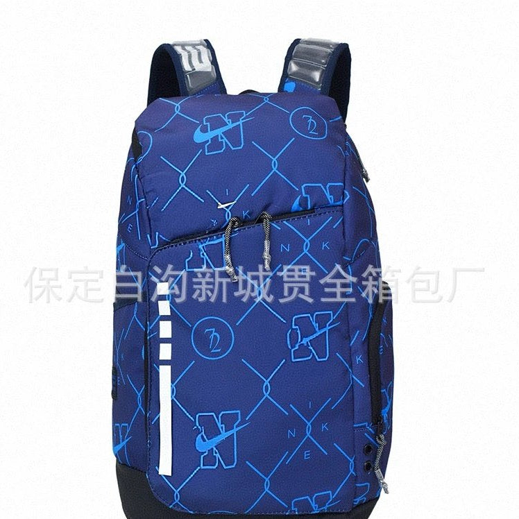 A blue and black Nike backpack with a repeating white and blue logo pattern, shown against a plain white background with a Chinese watermark across the middle.