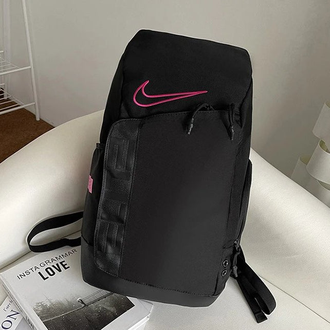 Black backpack with a pink logo on a white surface