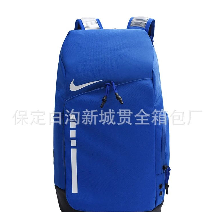 A royal blue Nike backpack with a white swoosh logo on the front, black base trim, and reflective straps, shown against a plain white background with a Chinese watermark across the middle.