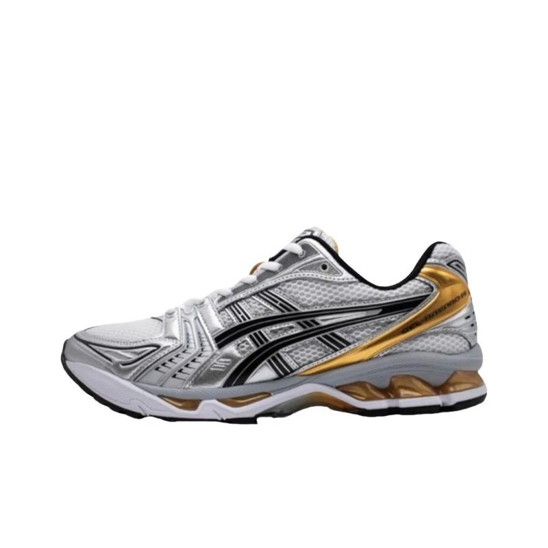 White athletic shoe with black and gold accents on a white background