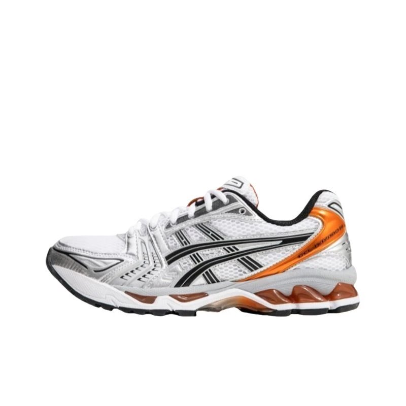 White running shoe with orange and black accents on a white background