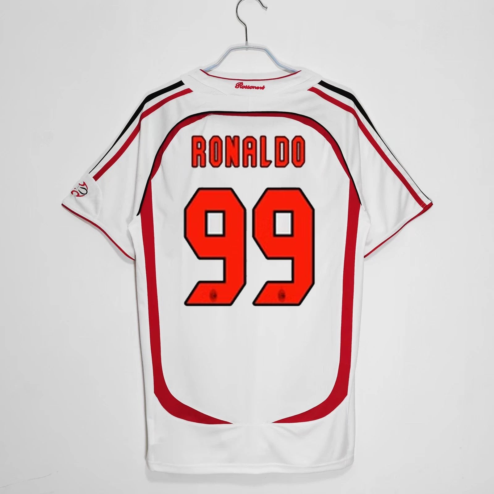 White soccer jersey with red accents and 'RONALDO 99' printed on a white background
